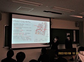 ②3D都市環境エリアにおける衛星測位システムの測位精度評価の発表の様子